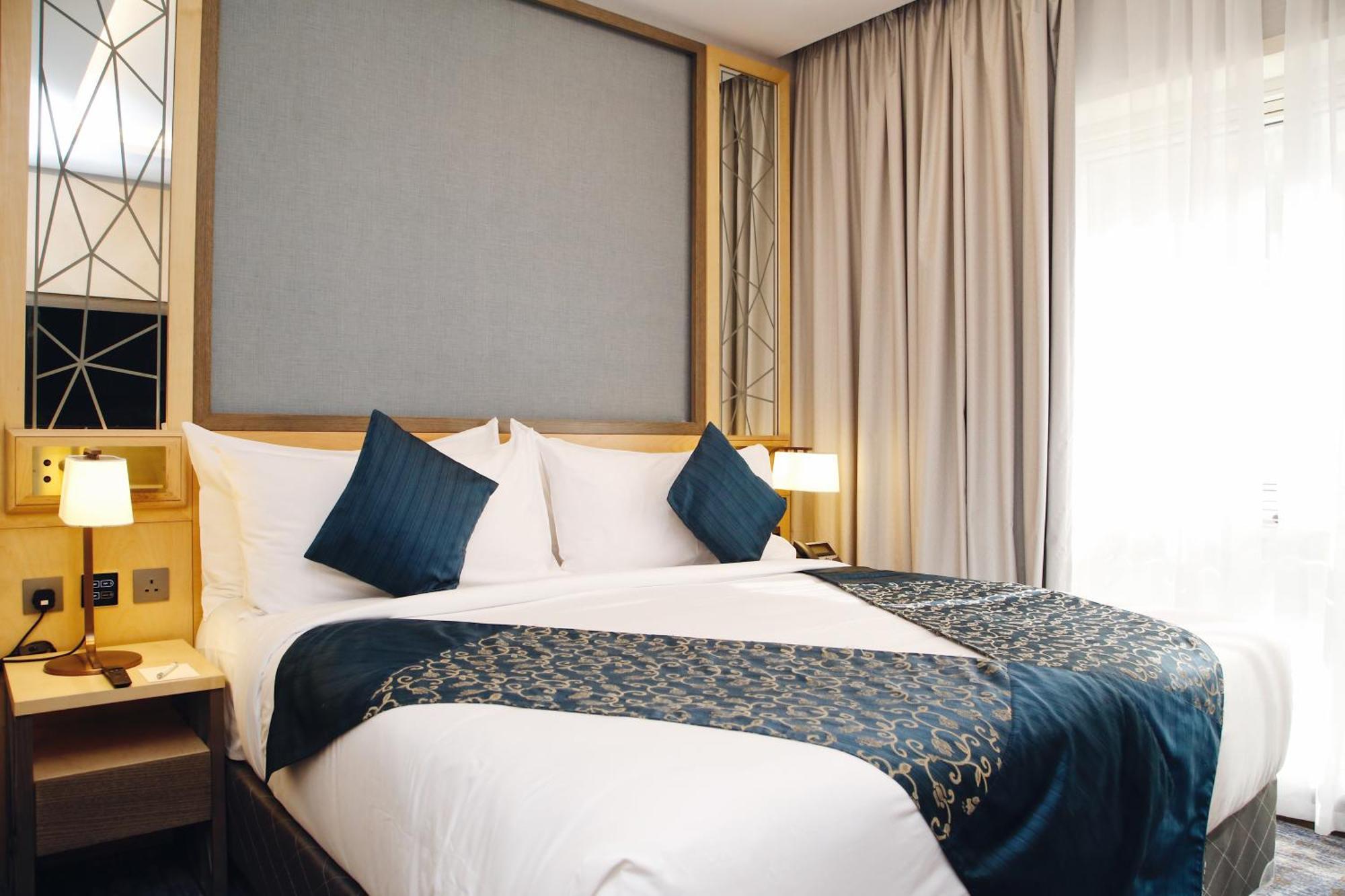 Maden Alrawda Hotel Medina Exterior foto A bed runner